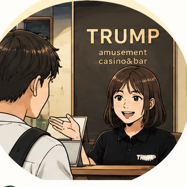 受付でスタッフに話しかけるお客さま